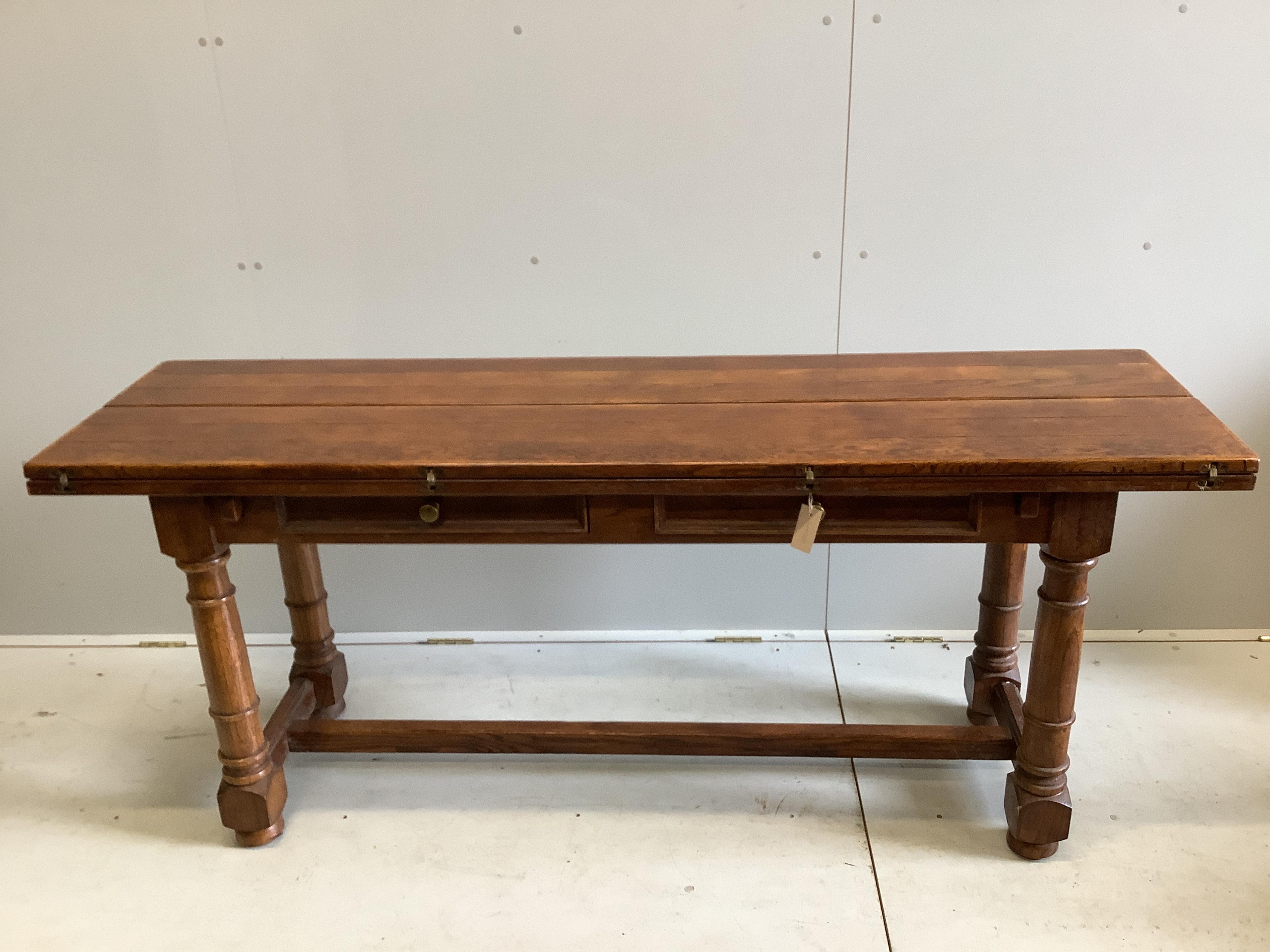 A 17th century style oak drop leaf refectory dining table, opens to 183 x 101cm, height 74cm, with a set of six Cromwellian style oak dining chairs. Condition - table with some marking to the top, upholstery to chairs wo